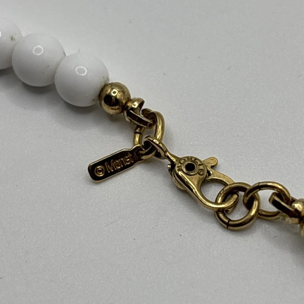 Long Vintage Monet White Graduated Bead Necklace Gold Tone Spacers 31